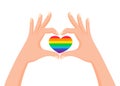 Hands make heart signwith LGBT rainbow color. Love is love. Pride concept